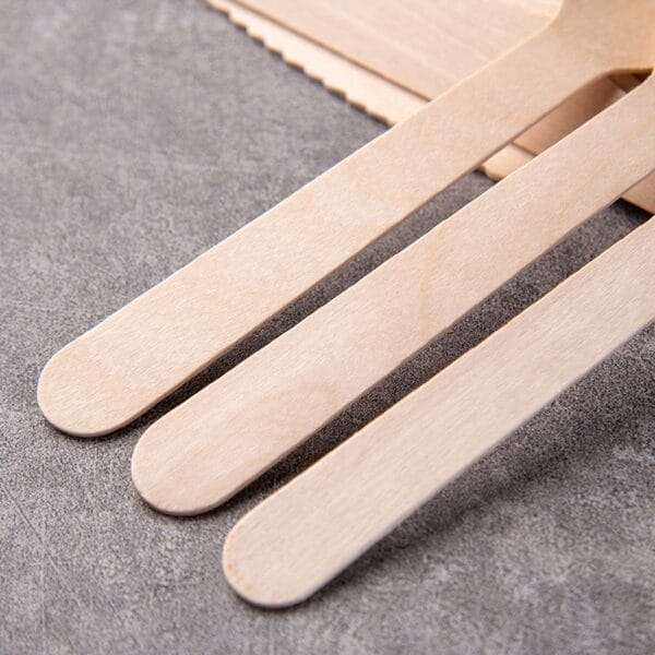 Eco-friendly wooden ice cream spoons; part of a wholesale custom set of disposable wooden cutlery.