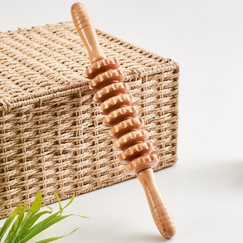 Wooden massage roller for back and muscle relief. Handcrafted self-massage tool with textured wheels. Wholesale available.