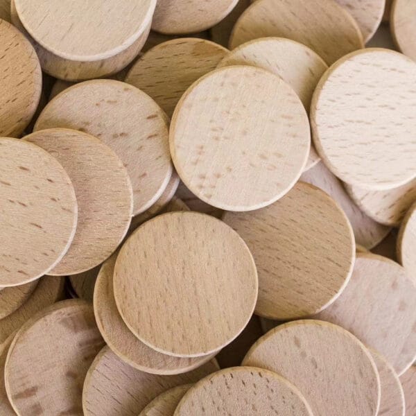 Custom Wooden Nickels: Bulk wholesale pack of unfinished light brown wooden discs.