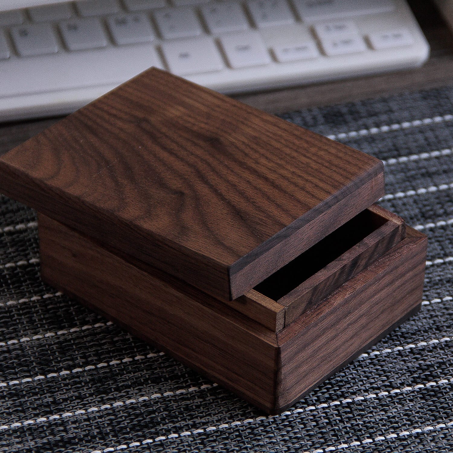 Custom Wooden Trinket Box: Dark brown laser engraved square wooden storage box with lid open, showcasing its interior.