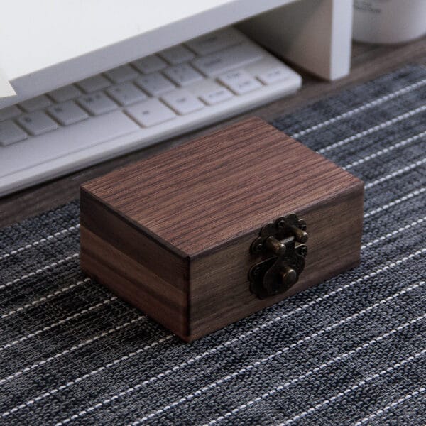 Custom Wooden Trinket Box: Laser engraved square wooden storage box with a dark brown finish and metal clasp.
