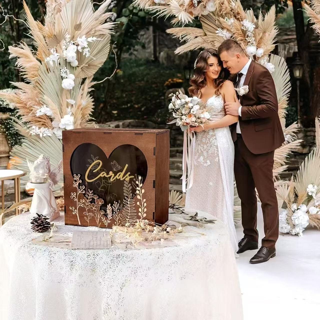 Rustic Wooden Wedding Card Box: Laser-cut floral design, heart-shaped opening. Wholesale available.