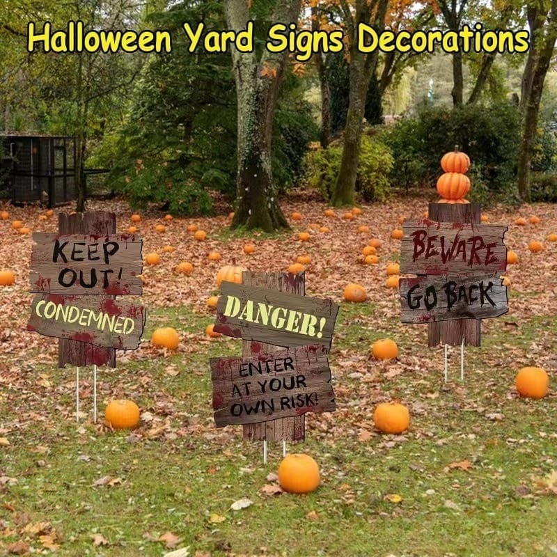 Halloween Yard Signs: Spooky autumn decorations featuring three wooden signs reading "Keep Out!", "Danger!", and "Beware!" Surrounded by pumpkins and fall leaves.