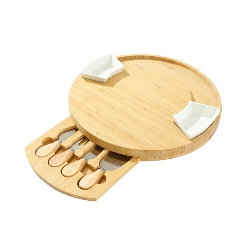 Bamboo cheese board with built-in cheese knife set and two serving bowls. Perfect for cheese and appetizer parties.