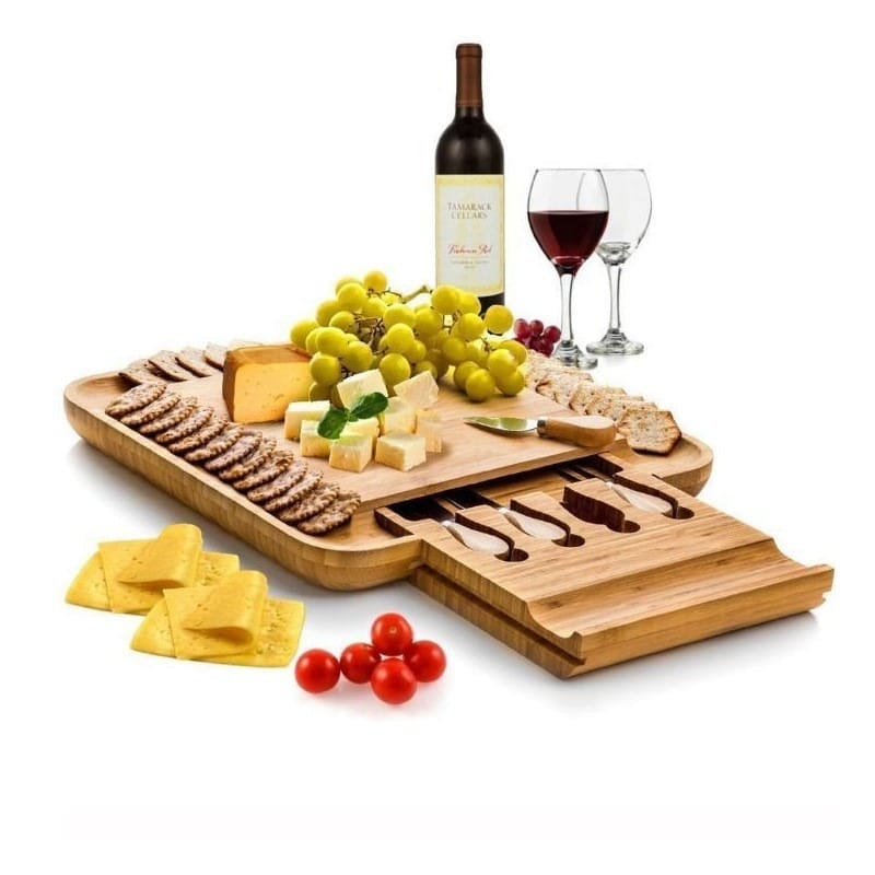 Bamboo cheese board with built-in drawer for cheese knives. Perfect for serving cheese, crackers, grapes, and wine.