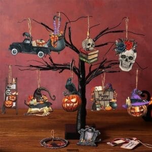 Halloween tree with hanging decorations: pumpkins, skulls, and spooky autumn ornaments on a dark branch