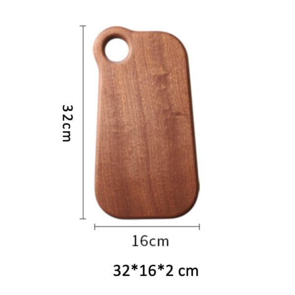 Walnut wood cutting board, 32x16x2 cm, with a convenient handle. Perfect for serving or cutting.