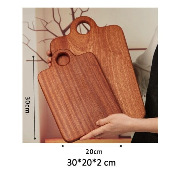 Set of two acacia wood cutting boards with handles; perfect for serving or chopping. Sizes: 30x20cm & smaller.