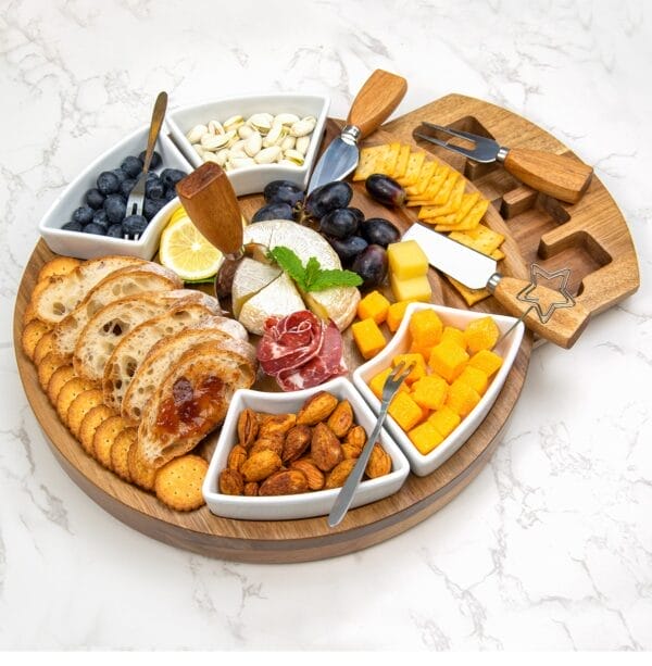 Wooden charcuterie board with compartments for cheese, crackers, fruit, nuts & more. Includes cheese knives & serving forks.