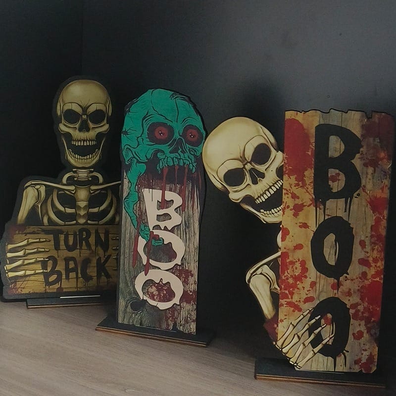 Wholesale Halloween Wood Signs: Rustic spooky outdoor decorations. Assorted styles feature skeletons and "Boo" and "Turn Back" messages.