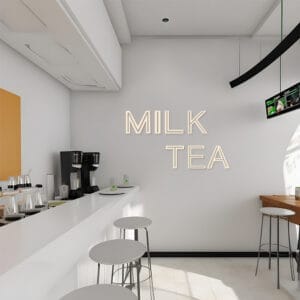 Modern milk tea shop interior with "MILK TEA" signage and bar seating.