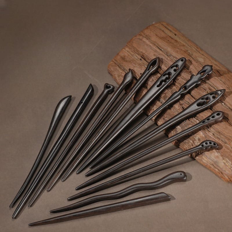 Vibrant green matcha tea with a bamboo whisk