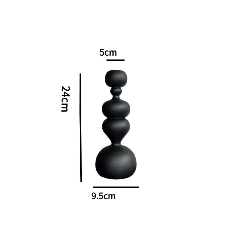 Black multi-tiered candle holder with dimensions: 24cm height, 9.5cm base, 5cm top.