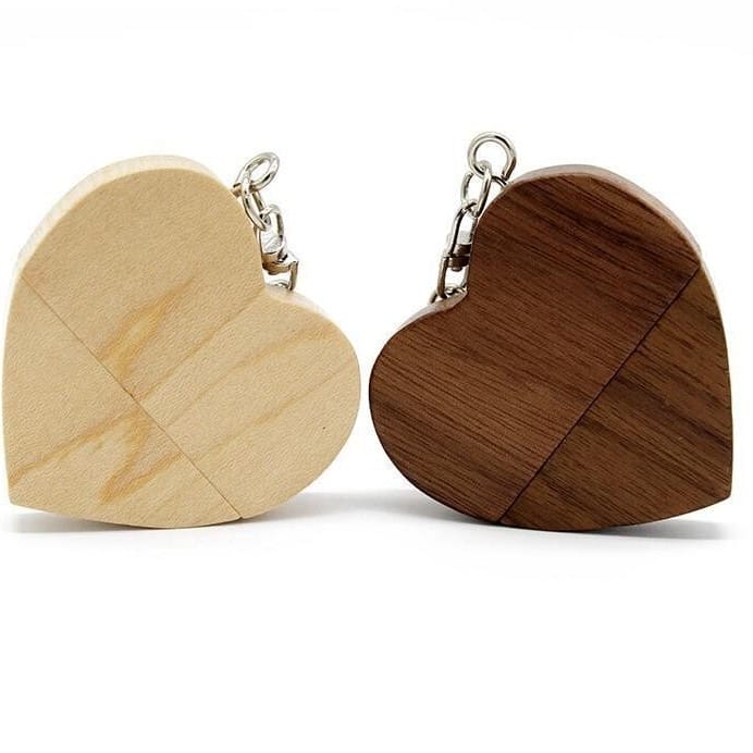 Custom Wooden USB Flash Drives: Heart-shaped in light and dark wood, ideal for wedding favors.