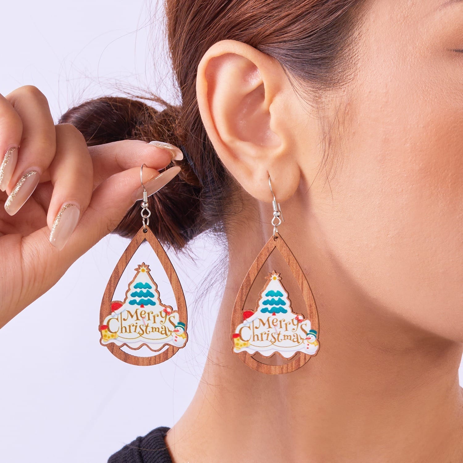 Teardrop Christmas earrings. Wooden frame, "Merry Christmas" design, festive holiday jewelry.