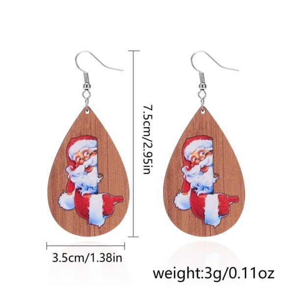 Santa Claus teardrop earrings, festive Christmas jewelry with wooden-look background