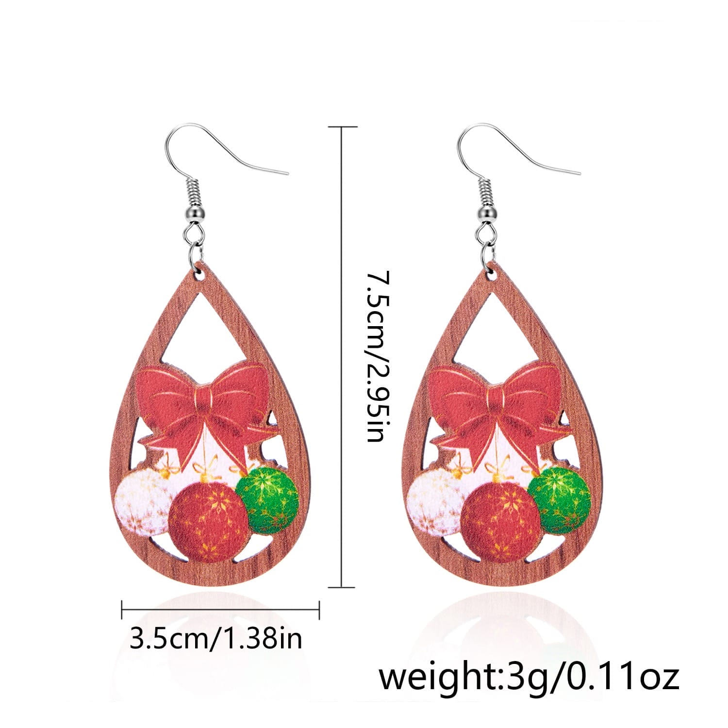 Teardrop Christmas earrings with bow and ornament design.