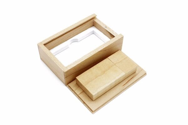 Wooden USB drive in a matching wooden box, ideal for gifting or storing digital files.