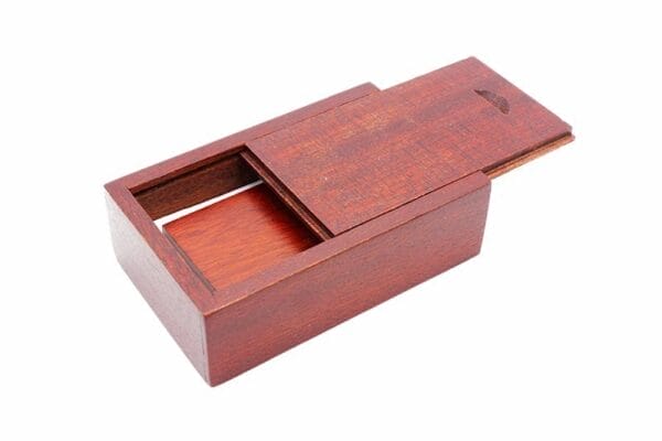 AUTO-DRAFT: Wooden box with a partially open sliding lid, showing the interior