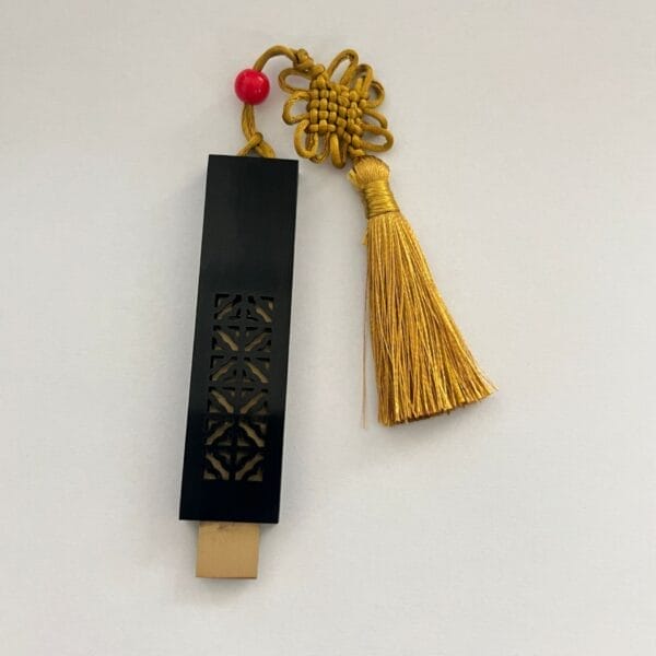 Personalized Wood USB Drive with gold tassel and red bead. Custom wooden flash drive with engraved logo.