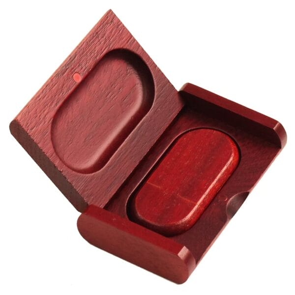 Wooden USB drive in matching handcrafted wooden box, open to display the drive