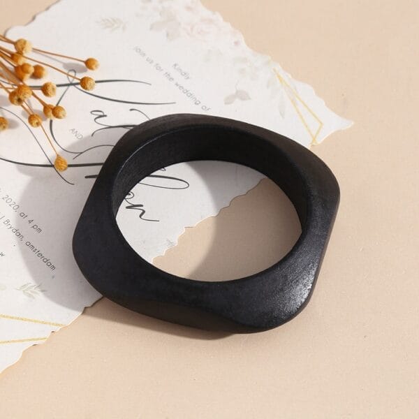Geometric Wooden Bangle: Niche stackable black wooden bangle with matte finish, 8.5-8.8 cm.