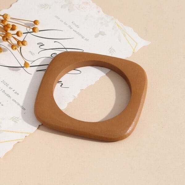 Geometric Wooden Bangle: Niche stackable wood bangle with matte finish, 8.5-8.8 cm.