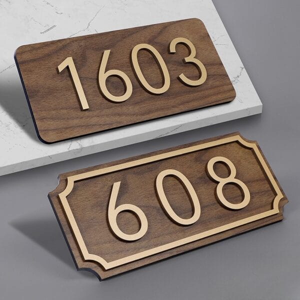 Personalised 11" Wooden House Number Signs: 1603 & 608 with gold numbers on wood.