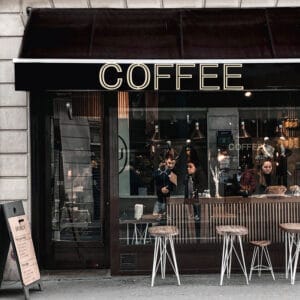 Stack of blueberry pancakes with syrup, perfect for a breakfast recipe.