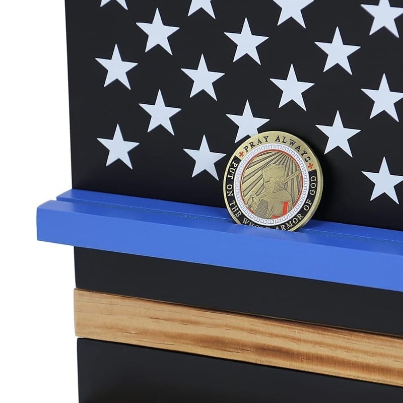 Thin Blue Line wooden display shelf with US flag design and "Pray Always" challenge coin.