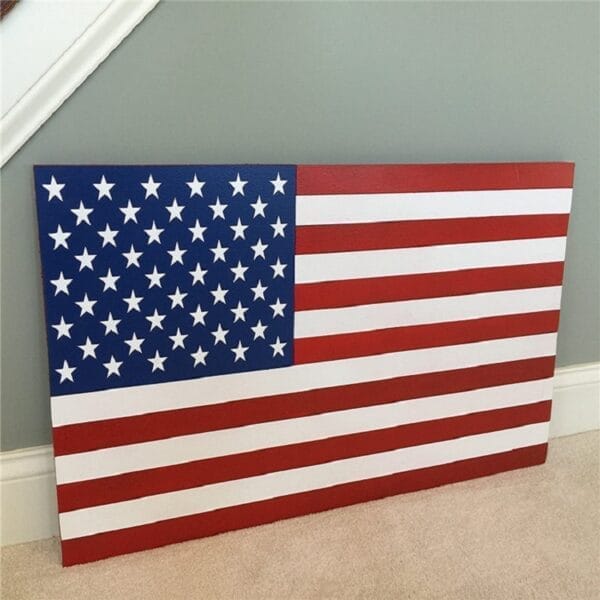 American flag painting. Patriotic wall art featuring red and white stripes and a blue star field.