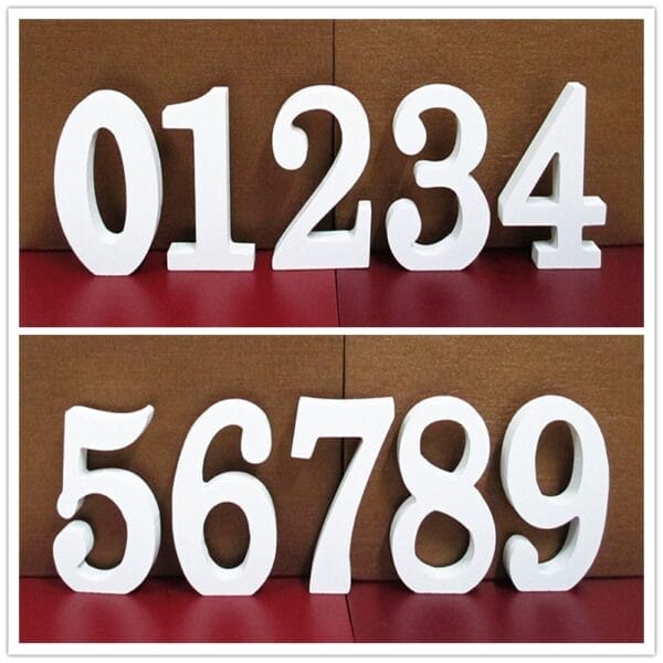 White wooden numbers 0, 1, 2, 3, 4, 5, 6, 7, 8, 9 for crafts or home decor
