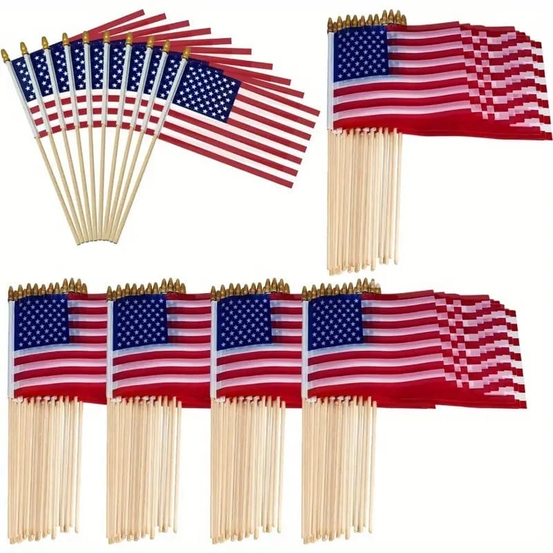 Collection of small American flags on wooden sticks
