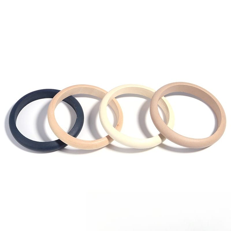 Wholesale Wooden Bangle Bracelets: Polished natural wood bangles in multicolor tones.