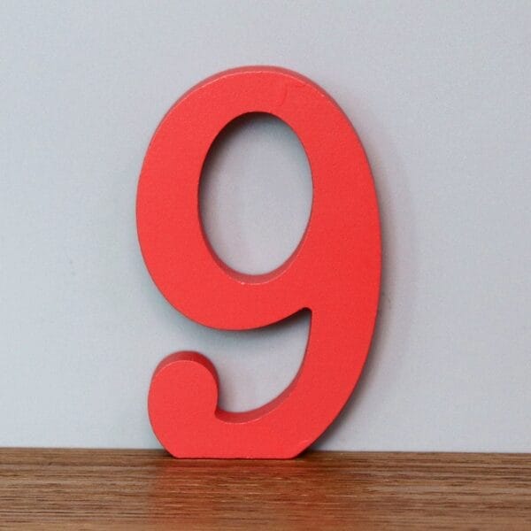 Red wooden number 9.