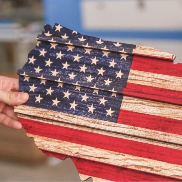 Custom Wooden US Flags Badge & Coin Display Rack: Rustic American flag-shaped keepsake organizer.