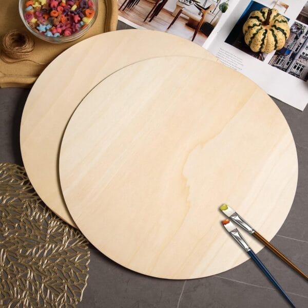 Wholesale Wood Rounds 18 Inch: Two unfinished round wood discs with craft supplies, ideal for DIY projects.