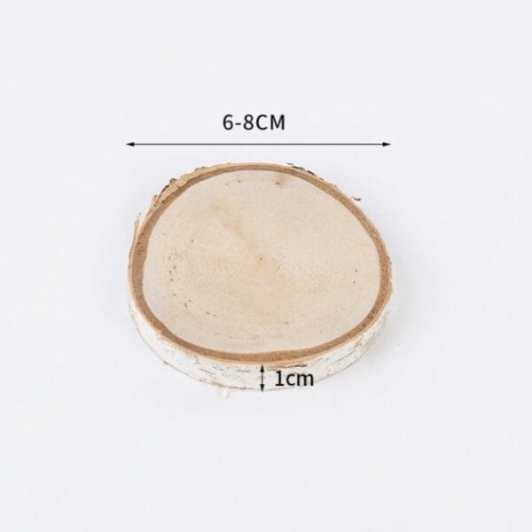 Wood slice with bark. Natural wood round, 6-8cm diameter, 1cm thick.