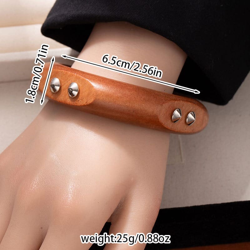 Black Wooden Bangle Cuff: Wide studded wooden bracelet. Dimensions: 6.5cm x 1.8cm. Weight: 25g.