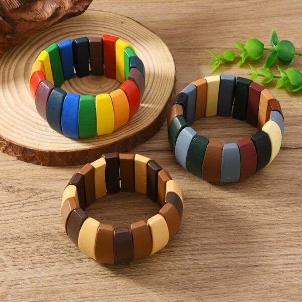 Colourful Wooden Bangles: Adjustable Boho Wide Bead Bracelets in rainbow and earth-tone hues.