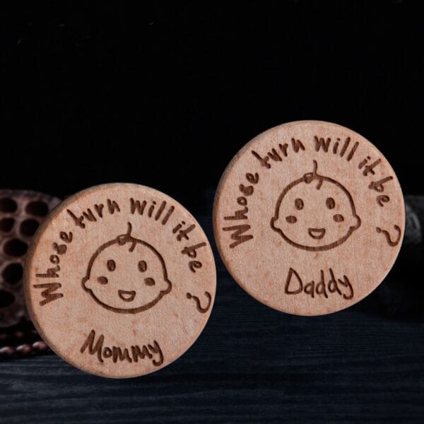 Custom Wooden Challenge Coins: "Mommy" and "Daddy" coins for deciding baby duties.