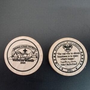 Custom Wooden Tokens: Laser-engraved Boy Scouts of America tokens featuring logos, text, and "Webelos Woods 2021
