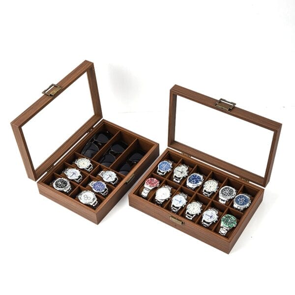Two wooden watch boxes with glass lids: one with watches & sunglasses, the other with watches only.