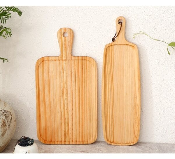 Pine wood trays wholesale: Square and rectangular serving boards with handles for restaurants.
