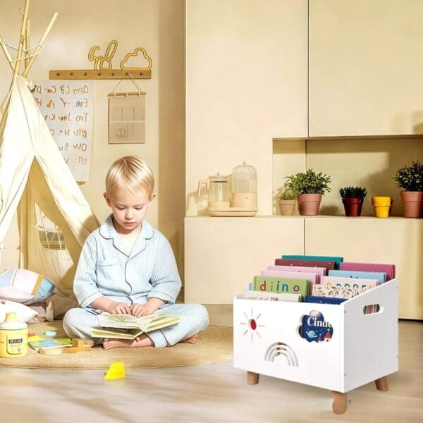 Wholesale White Wooden Toy Box: Child reading near a white bookshelf with colorful children's books in a playroom setting.