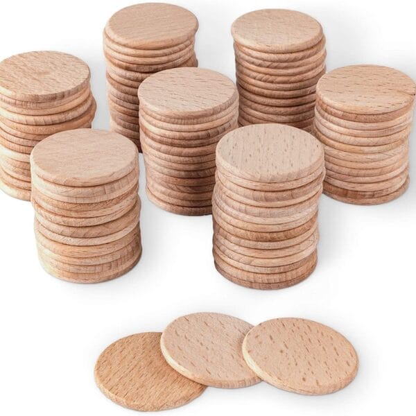 Stacks of Blank Beech Wooden Nickels, round wooden coins for custom tokens and crafting projects.