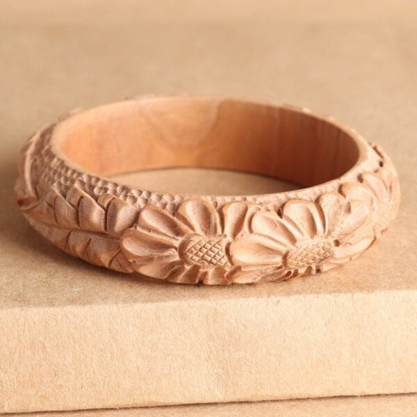 AUTO-DRAFT: Carved wooden bangle with intricate floral design