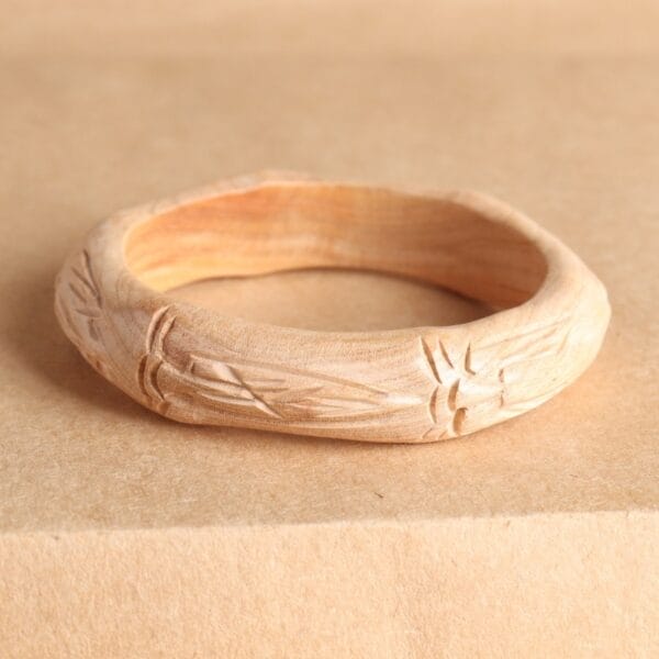 AUTO-DRAFT wooden bangle with carved floral details
