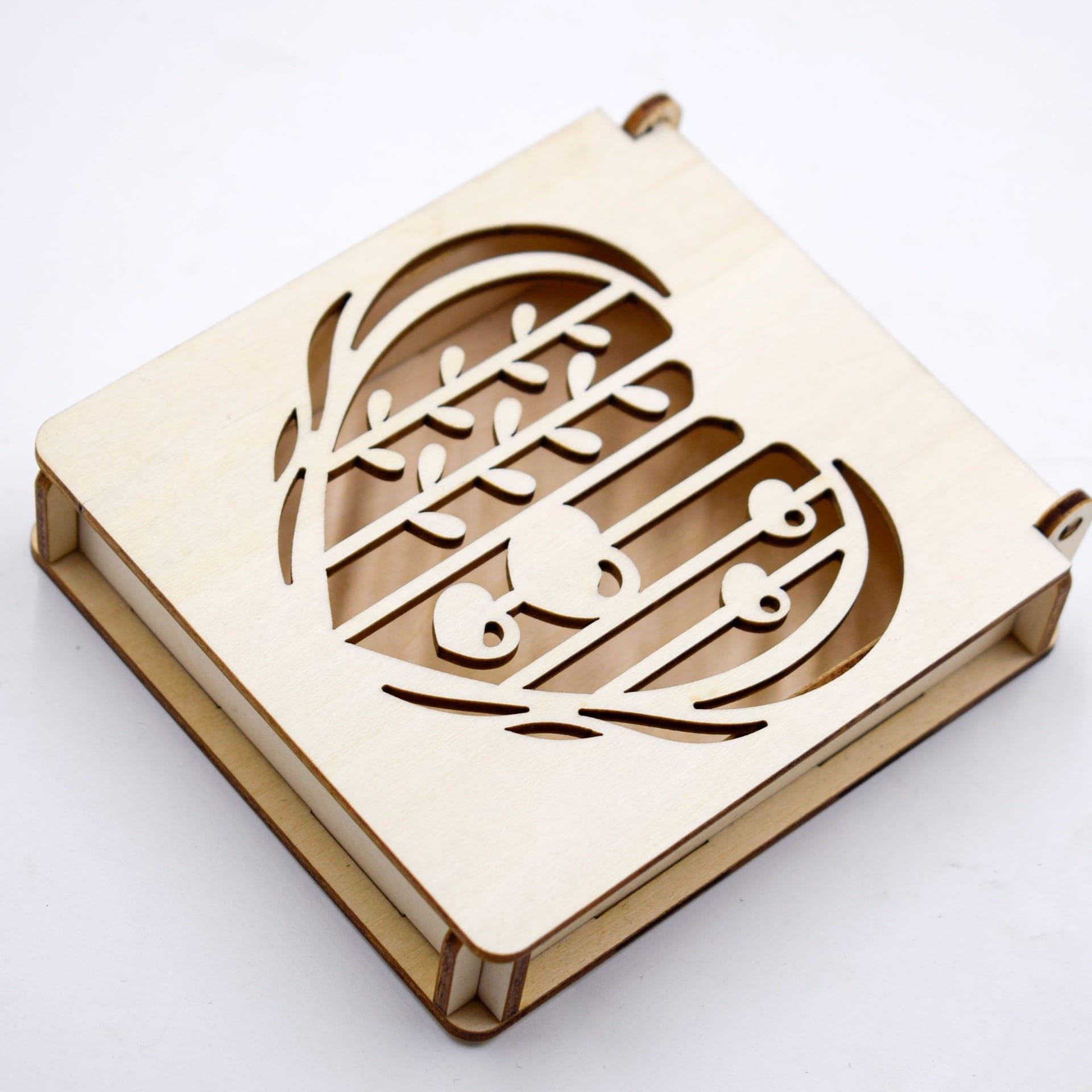 Carved wooden box with laser-cut heart design, perfect for gifting or storage