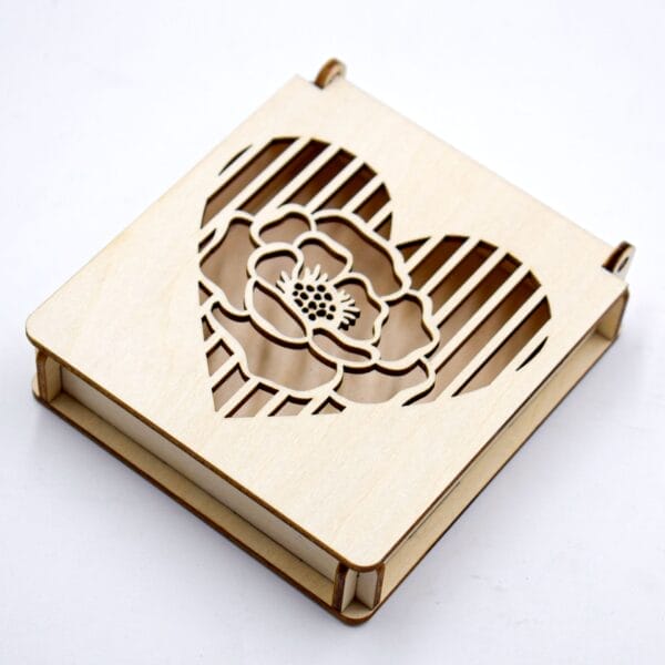 Custom Carved Wooden Box: Laser-cut wooden box with heart & flower design.